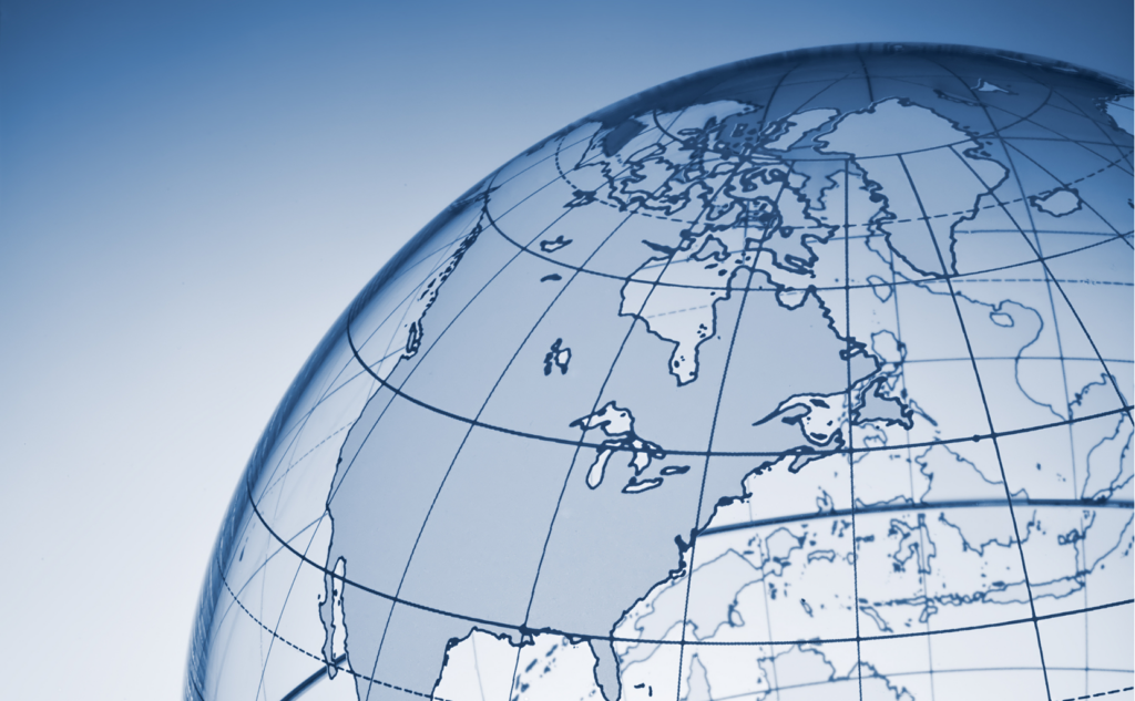 Image of a trasnparent globe on a blue background