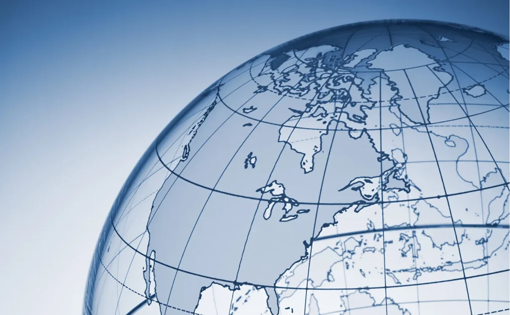 Image of a trasnparent globe on a blue background